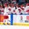 BUFFALO, NEW YORK - DECEMBER 26: Belarus forward Maxim Sushko #24 celebrates a goal against Switzerland with teammates on the players' bench during the preliminary round of the 2018 IIHF World Junior Championship. (Photo by Andrea Cardin/HHOF-IIHF Images)

